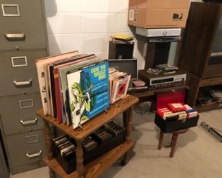 selection of albums, records and electronics 