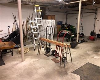 Saw horses, taller of the two wheelers and extension ladder are sold
