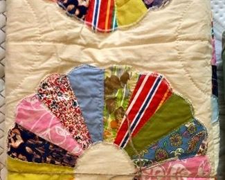 Hand made quilt with appliqued medallions. 