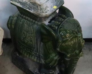 One of two Vietnamese green ceramic elephant garden stools