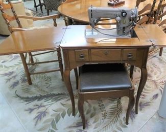 Singer sewing machine, stool and cabinet