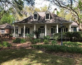 A taste of New Orleans in Haile Plantation. Every door in this home was custom built from old building doors in New Orleans.