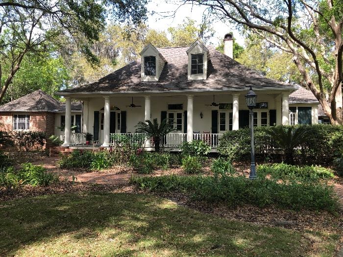 A taste of New Orleans in Haile Plantation. Every door in this home was custom built from old building doors in New Orleans. 