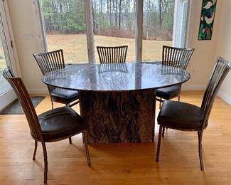 Stunning granite, oval dining table; granite top and granite base
