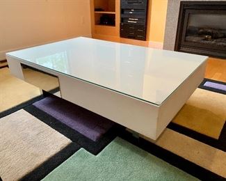 Custom handcrafted contemporary coffee table by Parnian Design feat. Chrome drawer front left. 30 x 48 x 14