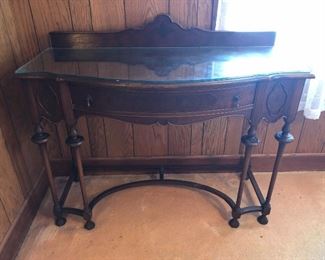 The matching sever is 46” long, 20” deep, and 34” high. This piece also has a glass top and is in excellent condition.
