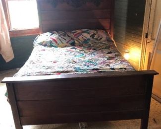 This antique bed is a ¾ bed. It is in exceptional condition. The headboard is 4’ 11”wide and it is 4’ 9” high. A regular double mattress will fit.