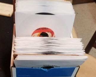 About 100 very clean with new dust covers 45 rpm's 1960's -1970's -1980's