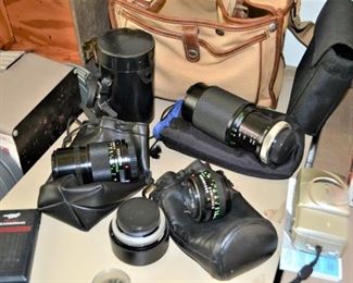 SEVERAL CAMERA LENS BY VIVITAR AND CANNON