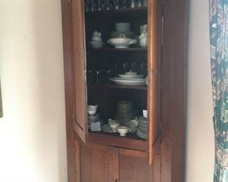 Early 1800s cherry corner cabinet