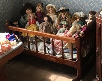 variety of antique dolls
