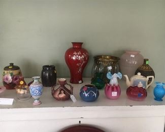 variety of colorful jars and vases