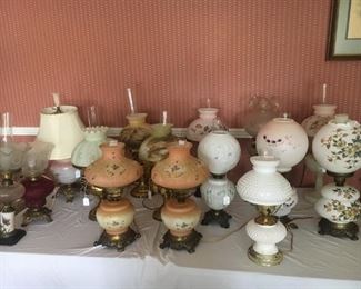 large selection of antique and vintage lamps