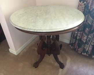 variety of small antique tables