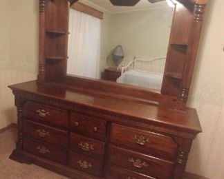 Wood dresser comes in two pieces for easy moving. 