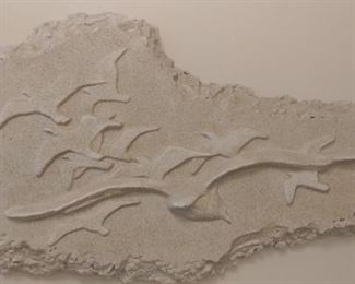 Sand sculpture with birds