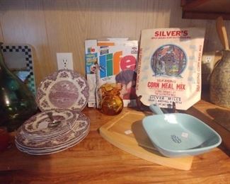 Mix of vintage things and contemporary glass duck cutting board.