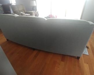 Back of grey sofa.