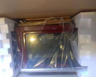 New in the Box Kitchenaide Countertop Convection Oven and Toaster Oven. Red color.
