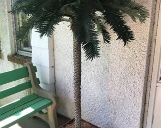 Faux Palm tree perfect for your outdoor oasis.