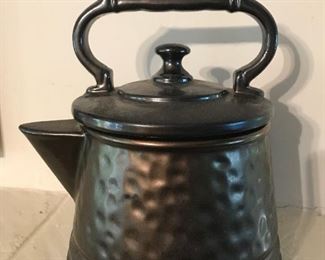 Signed McCoy pottery tea kettle cookie jar has a bronze hammered look.