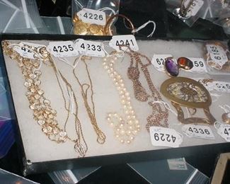 18KT and diamond necklaces, pins, etc.