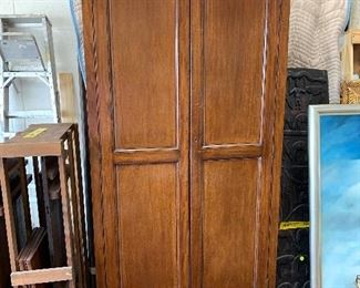Late 19th Century English Mahogany Two Door Wardrobe.  Flat, molded pediment over pair full length double paneled doors enclosing interior shelves, plinth base.  H: 82 1/2" W: 39 1/2; D: 13 3/4".  Provenance: purchased from The Antiques Gallery, LTD.  Savage, Md.  $875