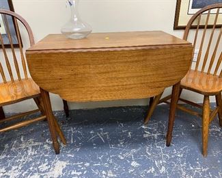 Drop leaf table.  Dimensions: H: 2' 5" x 2' 9 1/2 ".  $250  Great condition