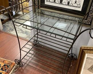 Trendy metal Bar cart with glass top.  Dimensions: 31.5 " l x 17" d x 28" ht.  $125  Great condition 