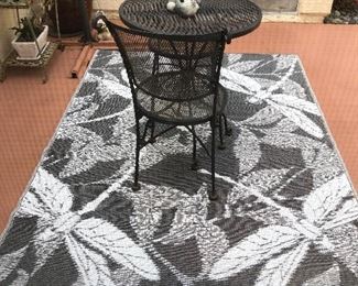 New indoor/out door rug with table and 2 chairs