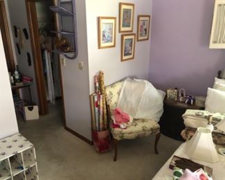 Nice comfy parsons chair, wall decor and one of two Spanish Colonial Nightstands.