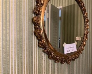 oval gold gilded mirror