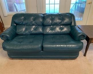 #11	Broyhill hunter green leather loveseat with nail head trim 60"L	 $100.00 
