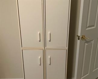 #24	White laminate cabinet with 4 doors 24"x12"63"	 $30.00 
