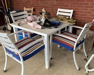 #61 patio table w/4 chairs + new cushions $50