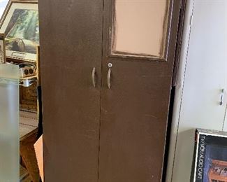 #67 brown metal cabinet 31x21x66  $50