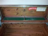 Vintage Art Deco Waterfall LANE Cedar Blanket Chest
This beautiful cedar blanket chest made by LANE around 1940 is in mint condition. On the upper lid all the original labels are intact, there's also a built in compartment that's divided into two sections lined with green felt. The exterior of the chest shows some age but in very good condition. The bottom front has some chips, but that's typical for being that old. It has some imperfections but for it's age in great shape. The lid opens and closes well. Size: 47"L x 19"D x 22"H