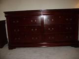 Beautiful Six Drawer Dresser!
This piece is a solid cherry with two privacy drawers adorned with an elegant red felt inlay. Normal signs of use or wear should be expected such as minor nicks, dings or light rubs but otherwise this piece is in great condition and would make a gorgeous addition to any bedroom.
Size: 68" by 19.5"