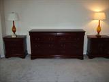 Beautiful Six Drawer Dresser!
This piece is a solid cherry with two privacy drawers adorned with an elegant red felt inlay. Normal signs of use or wear should be expected such as minor nicks, dings or light rubs but otherwise this piece is in great condition and would make a gorgeous addition to any bedroom.
Size: 68" by 19.5"
Beautiful Two Drawer Nightstands! (pair)
This piece is a solid cherry with one privacy drawer adorned with an elegant red felt inlay. Normal signs of use or wear should be expected such as minor nicks, dings or light rubs but otherwise this piece is in great condition and would make a gorgeous addition to any bedroom.
Size: 27" by 18"