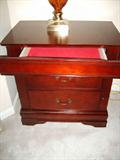Beautiful Two Drawer Nightstands! (pair)
This piece is a solid cherry with one privacy drawer adorned with an elegant red felt inlay. Normal signs of use or wear should be expected such as minor nicks, dings or light rubs but otherwise this piece is in great condition and would make a gorgeous addition to any bedroom.
Size: 27" by 18"
