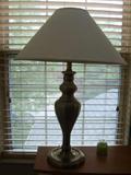 Lamp
This metallic silver lamp has very smooth delicate curves adorned with a white lamp shade. All in working order, very good condition! Adds the perfect modern touch in any room!