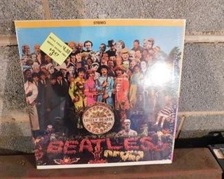 Sealed Beatles Sgt. Peppers Lonely Hearts Club Band Album(Plastic has Split Along Bottom Edge) 