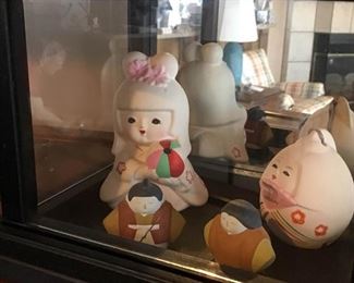 Asian Ceramic Art in Display Case https://ctbids.com/#!/description/share/363904