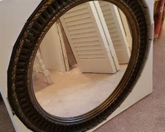 $30 - Item #7: Contemporary NIB mirror, approx. 25" round. 