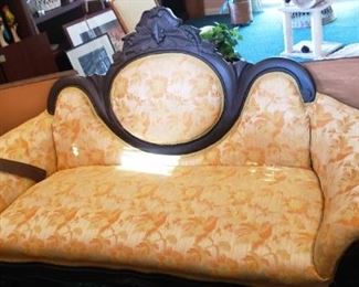 $100 - Item #18: Antique settee. All wood in good condition, vintage sateen fabric. 64" long, 39" tallest point
