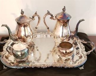 $60 - Item #40: Silver plated tea set. Includes tray. marked Roger Silver Co.