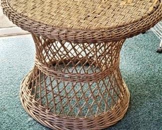 $20 - Item #137: Woven, wicker table. Has damage, see photos. 21" round, 26" tall