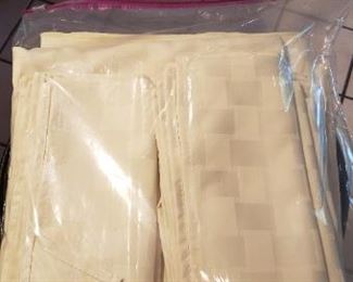 $15 - Item #159: Ivory tablecloth and napkins for 6