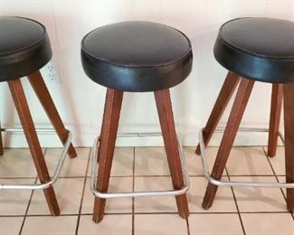 $30ea - Item #185 A-C: Swivel top bar stool with wood legs, 3 available. 1 on far left sticks, the rest free swivel. Counter ht, top of stool is 26" from floor