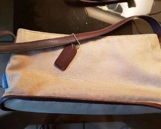 $20 - Item #214: Vintage Coach purse. Does have some scuff and discoloration. Did not look up the serial numbers. Canvas and leather? EGD-6136